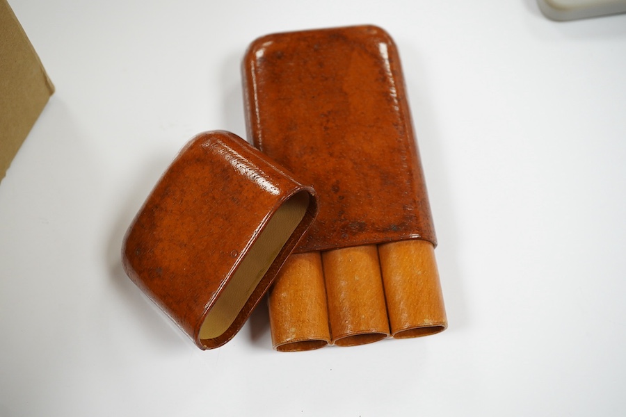 Assorted leather cigar cases, a shagreen cigarette case, a book of cigar labels and a wooden box, shagreen case 9cm high. Condition - box poor, cases fair to good